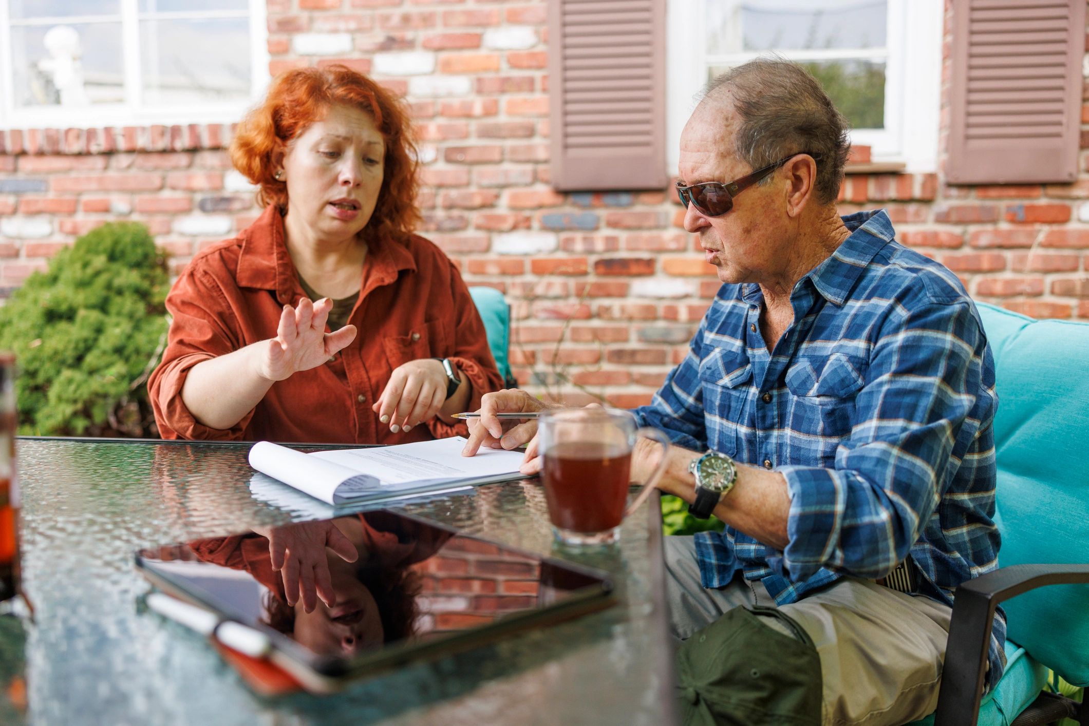 Insurance agent reviewing coverage documents with a client